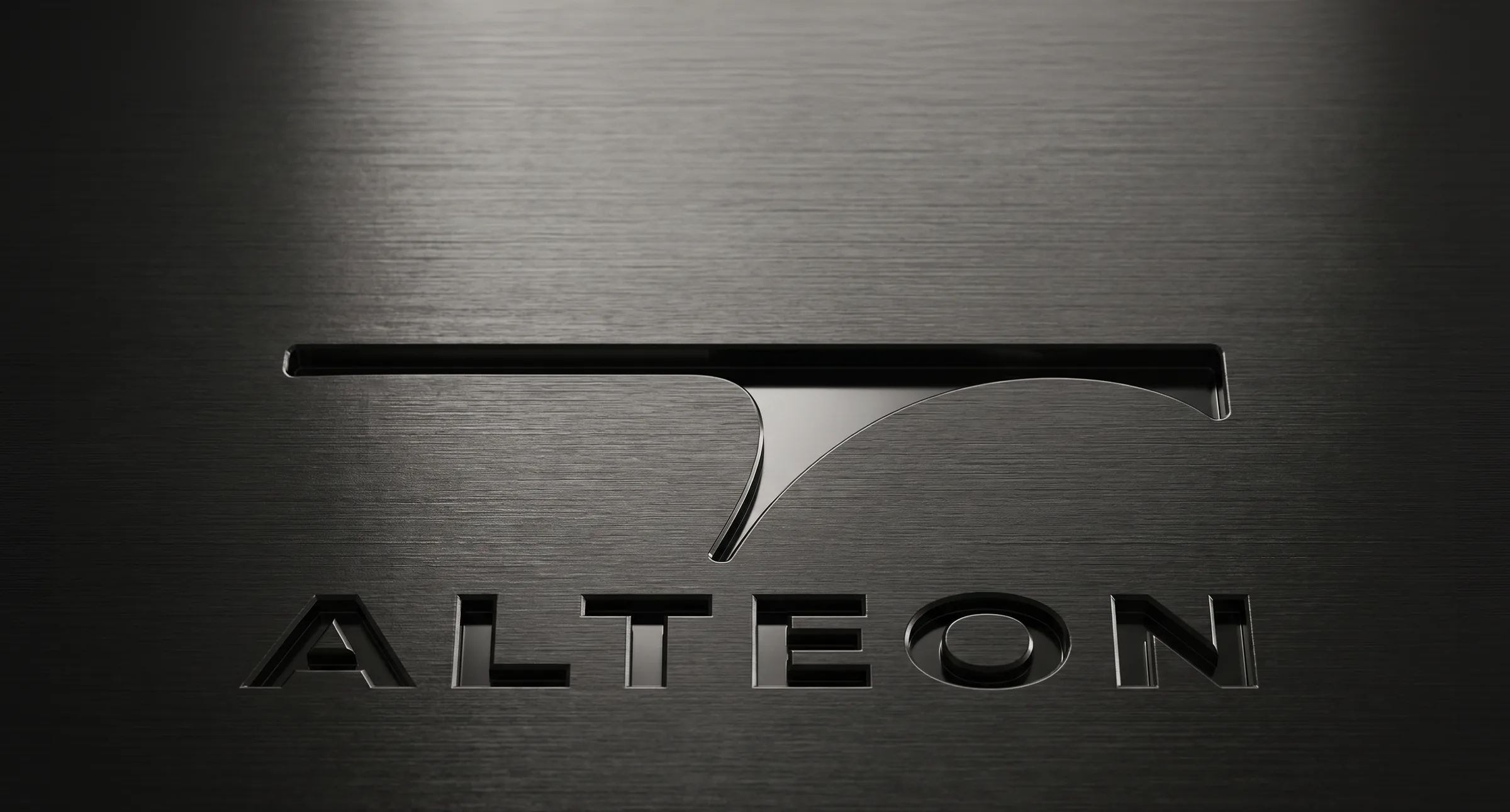 The Alteon monogram and wordmark, machined into brushed metal.